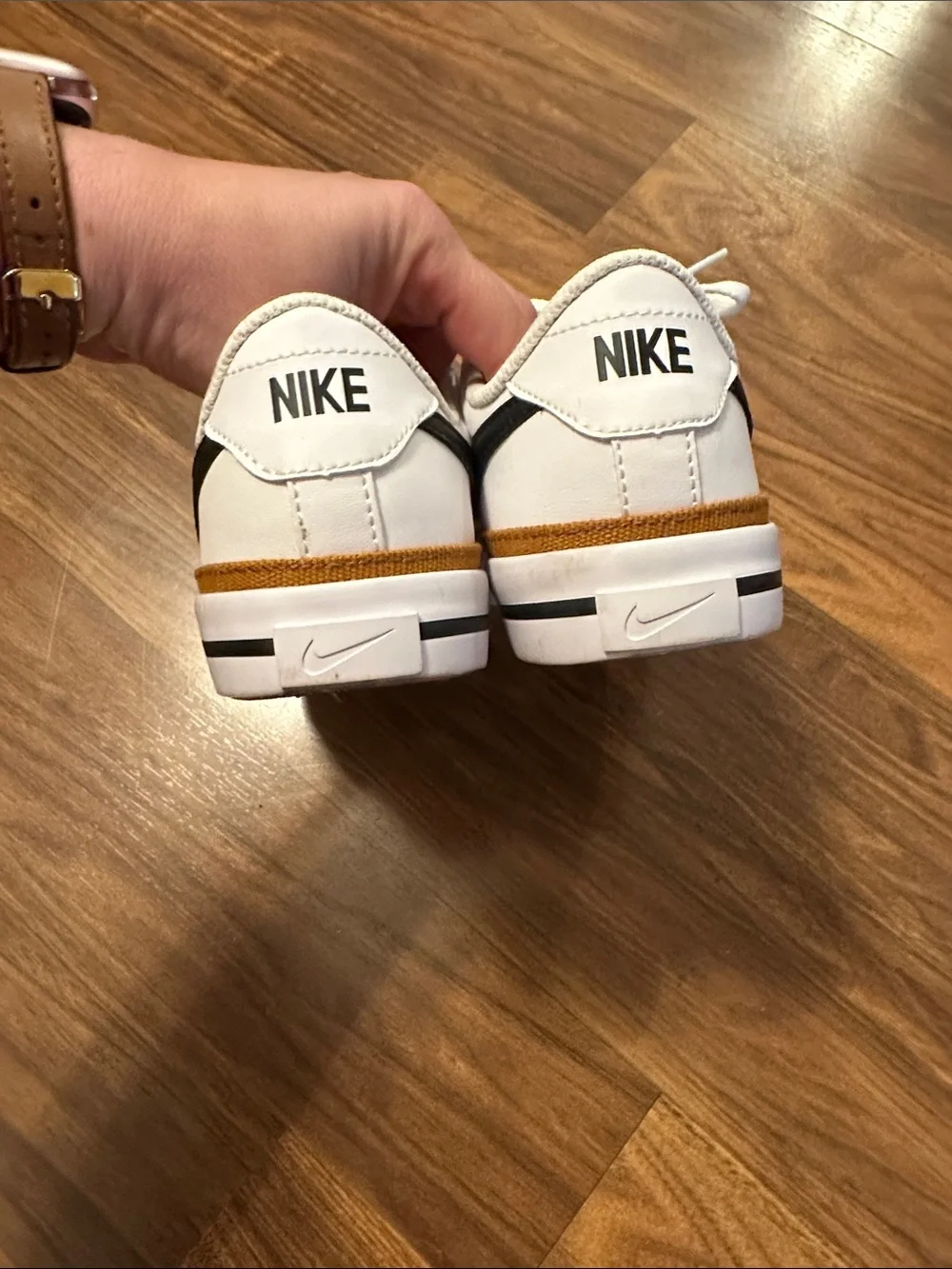 Nike Kid Low-Top Sneakers in White, Black & Gold